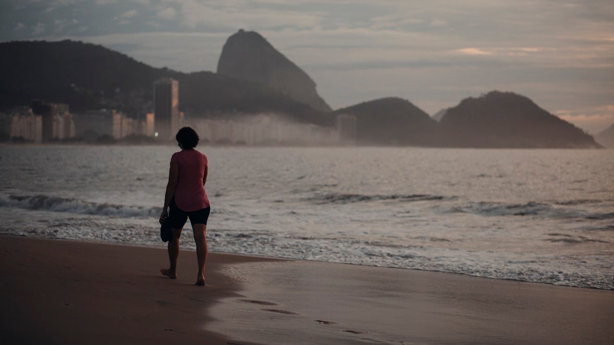 Woman walking on the beach